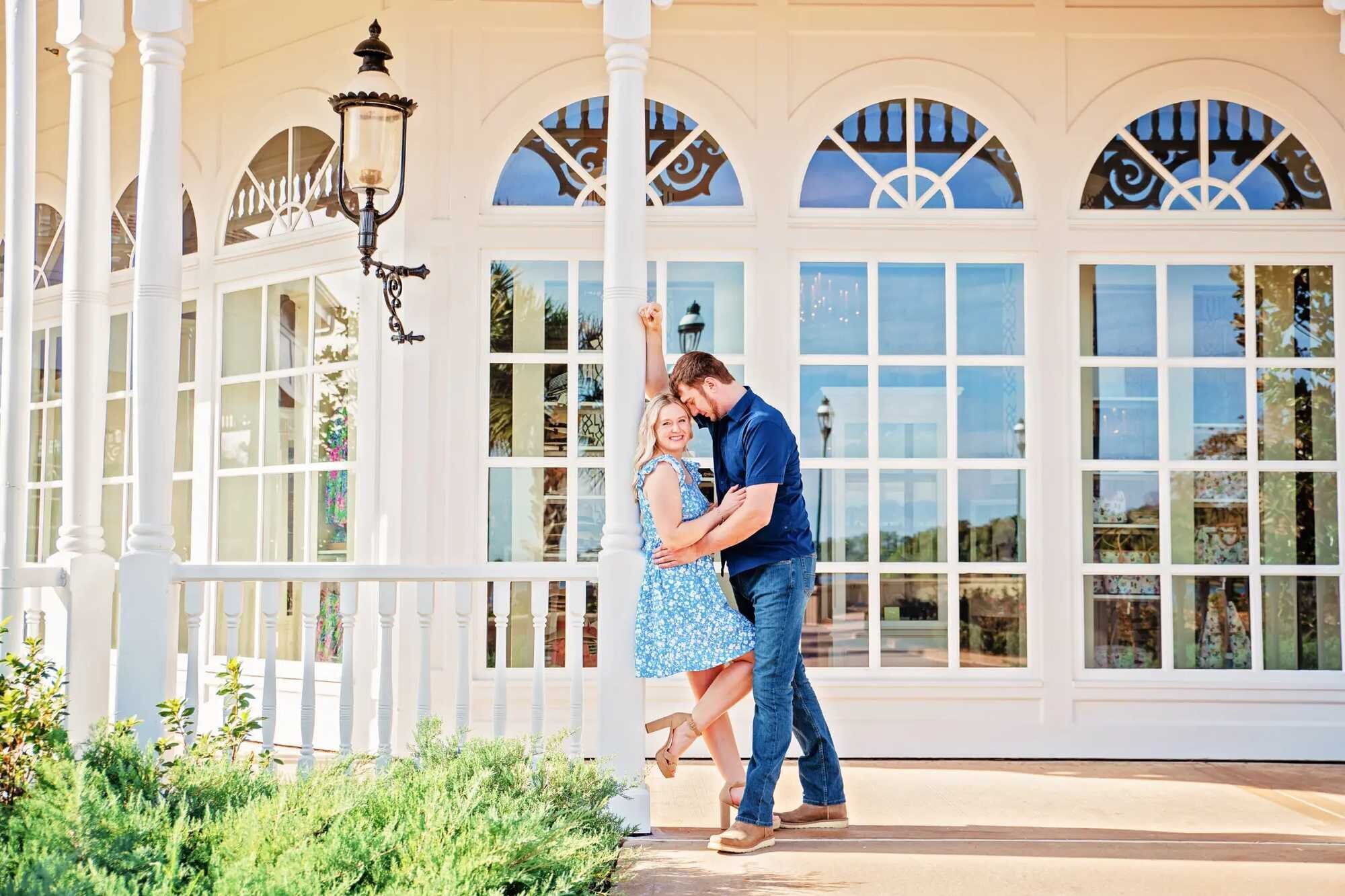 Orlando couples photographer capturing a couple dancing on the porch of the Disney Grand Floridian Resort