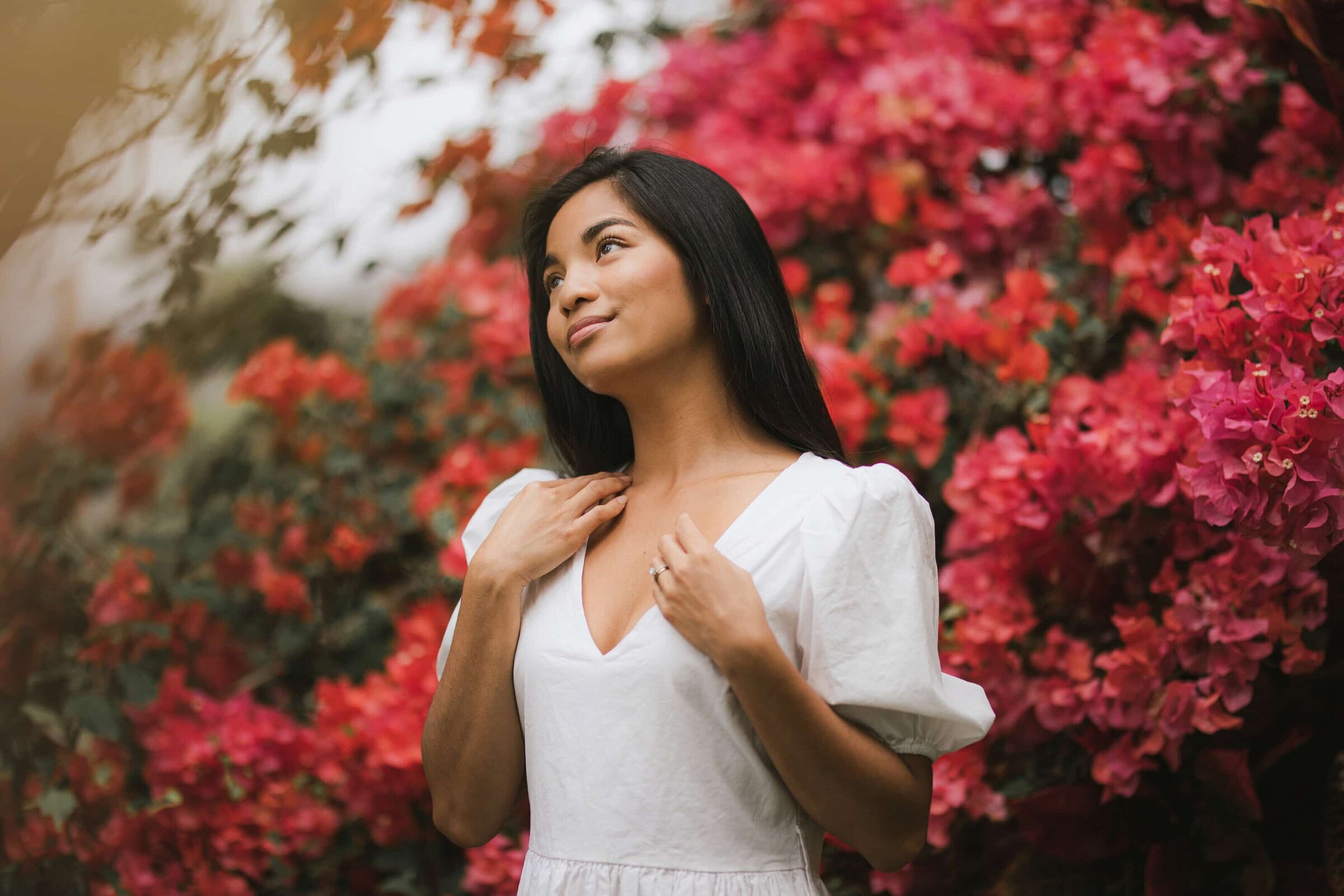 Maui photographer — woman in white dress with pink bougainvillea