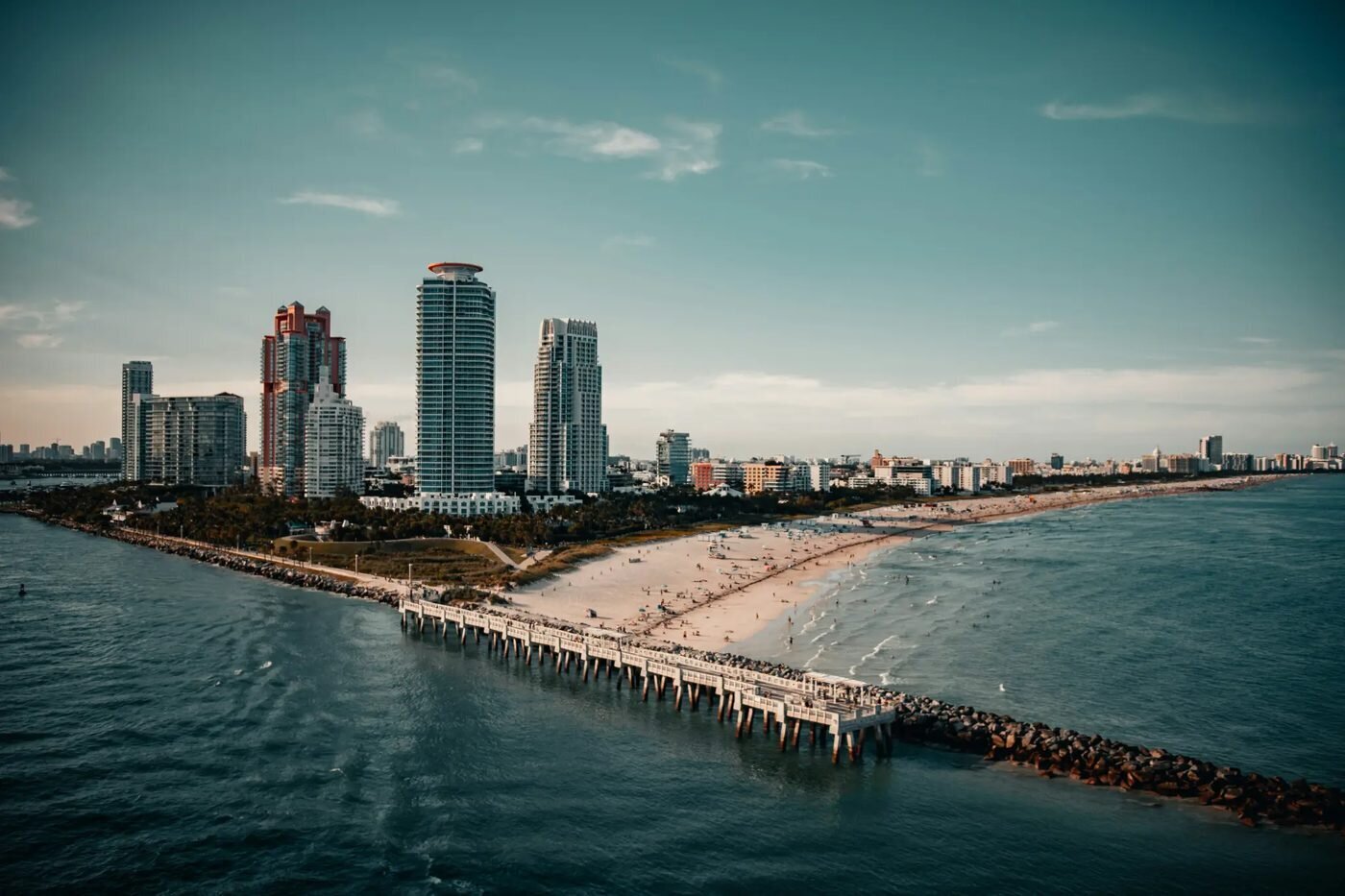 Aerial view of South Pointe Park pier and Miami Beach skyline, a scenic location for engagement photos in Miami