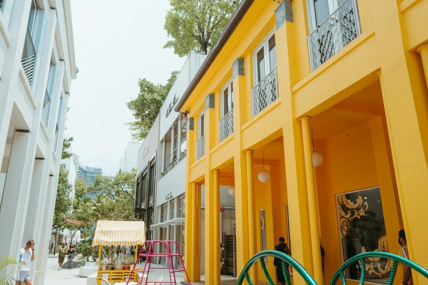 Colorful architecture and upscale street scene in the Miami Design District, an editorial engagement photo location